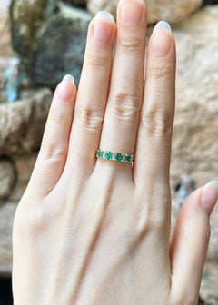 Emerald with Diamond Ring set in 18K Gold Settings