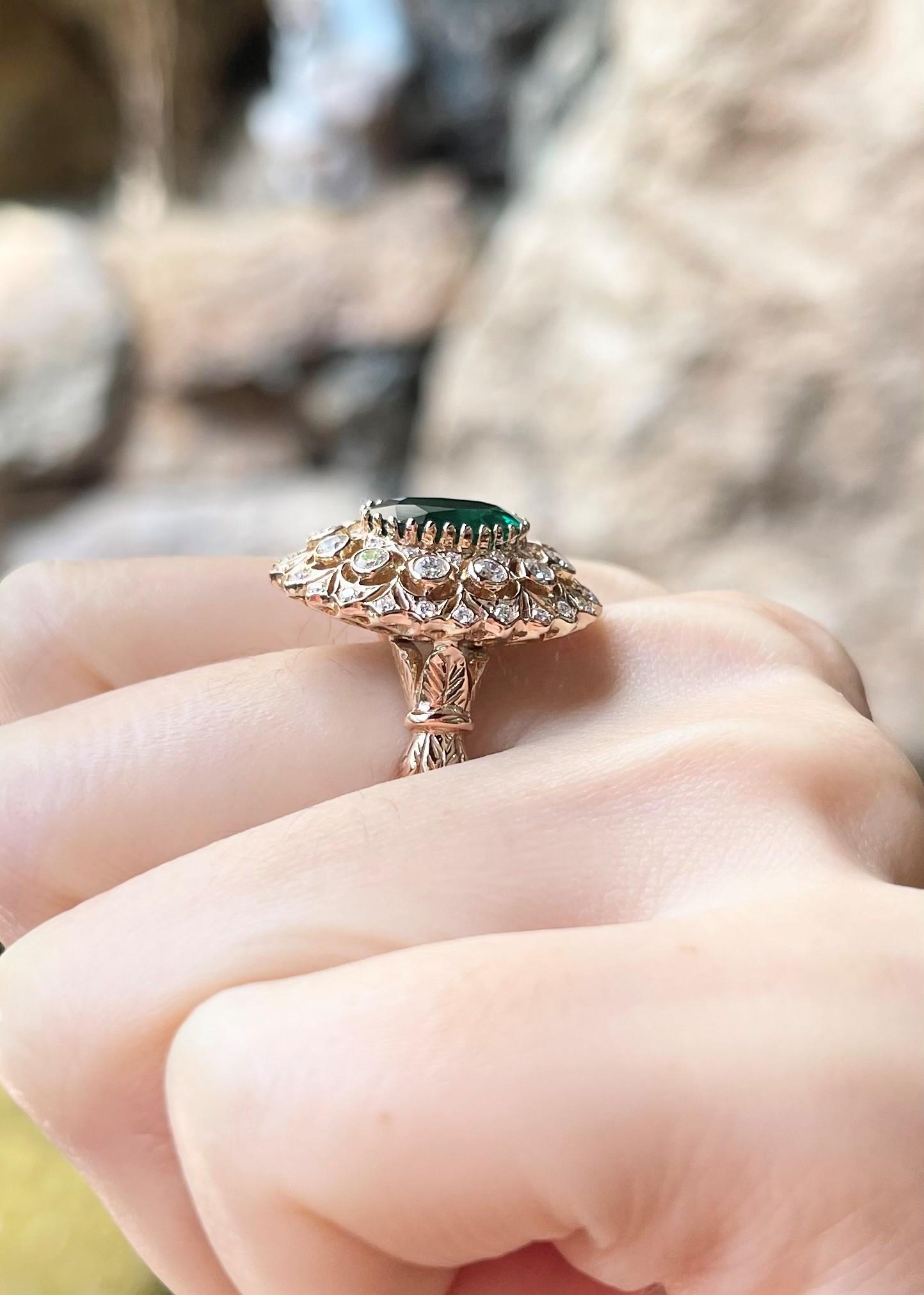 Oval Cut Emerald with Diamond Ring set in 18K Rose Gold Settings For Sale