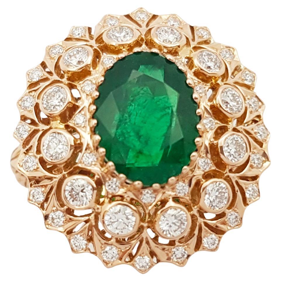 Emerald with Diamond Ring set in 18K Rose Gold Settings