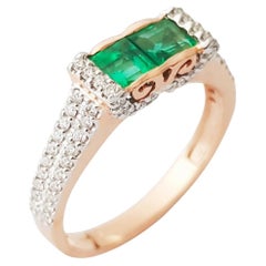 Emerald with Diamond Ring set in 18K Rose Gold Settings
