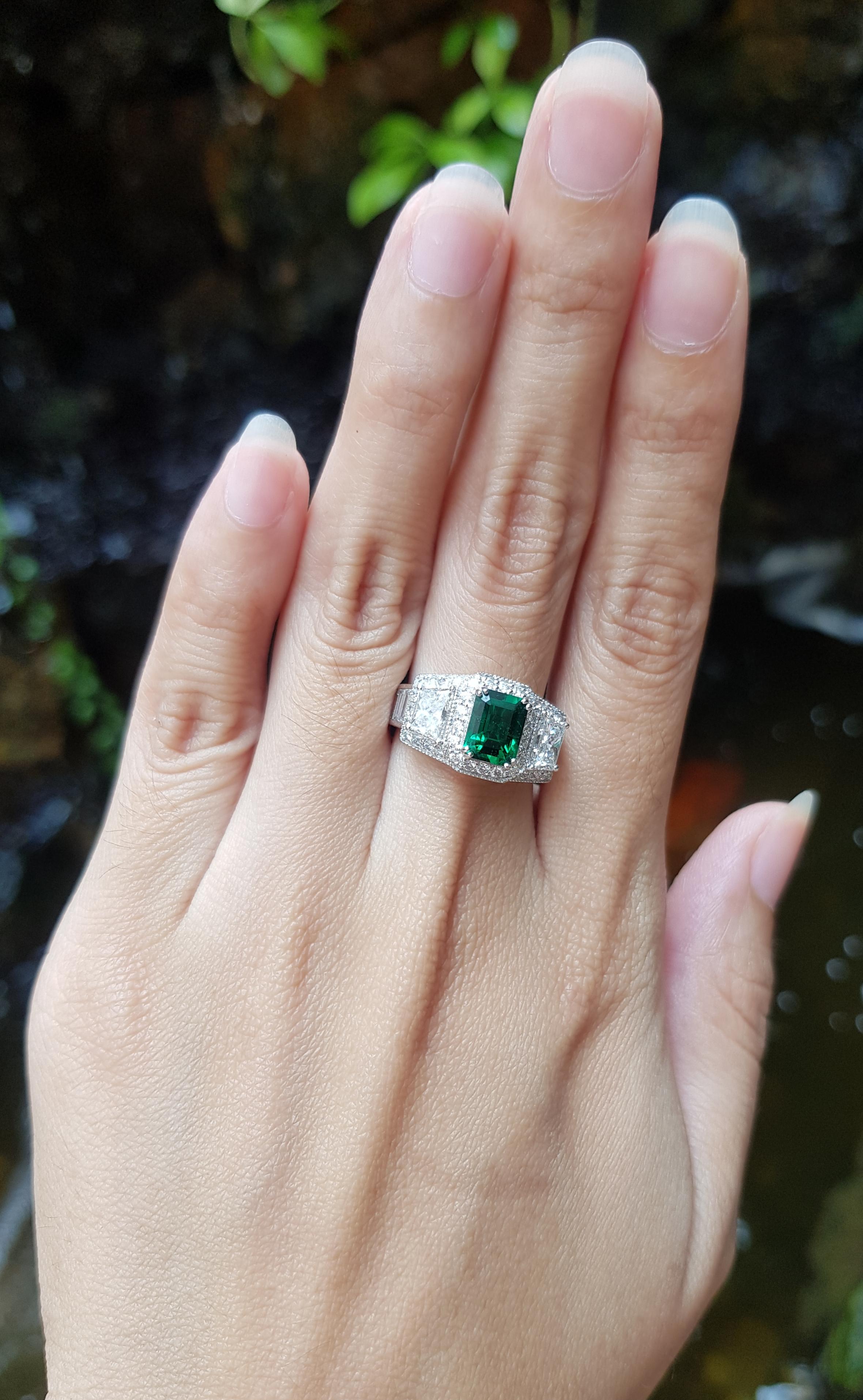 Emerald 1.12 carats with Diamond 2.27 carats Ring set in Platinum 950 Settings

Width:  1.8 cm 
Length: 1.0 cm
Ring Size: 52
Total Weight: 10.06 grams

Emerald
Width:  0.6 cm 
Length: 0.8 cm


