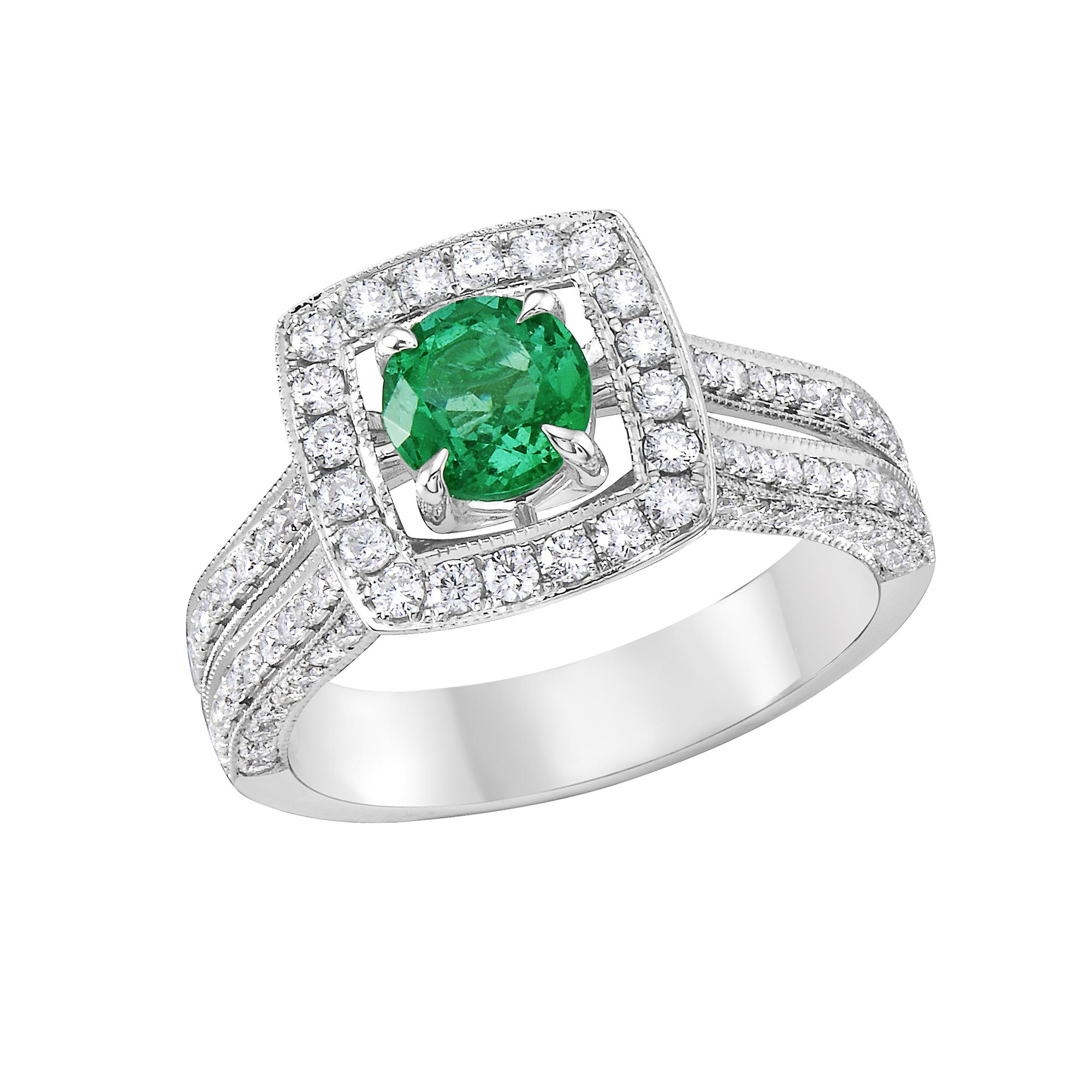 Elegant Emerald ring in Round shape bounded by Round diamonds at all sides and corners.

Secure Yours Today: Limited stock available. Don't miss the chance to secure your Emerald Diamond Ring today. It's not just a ring; it's a way of