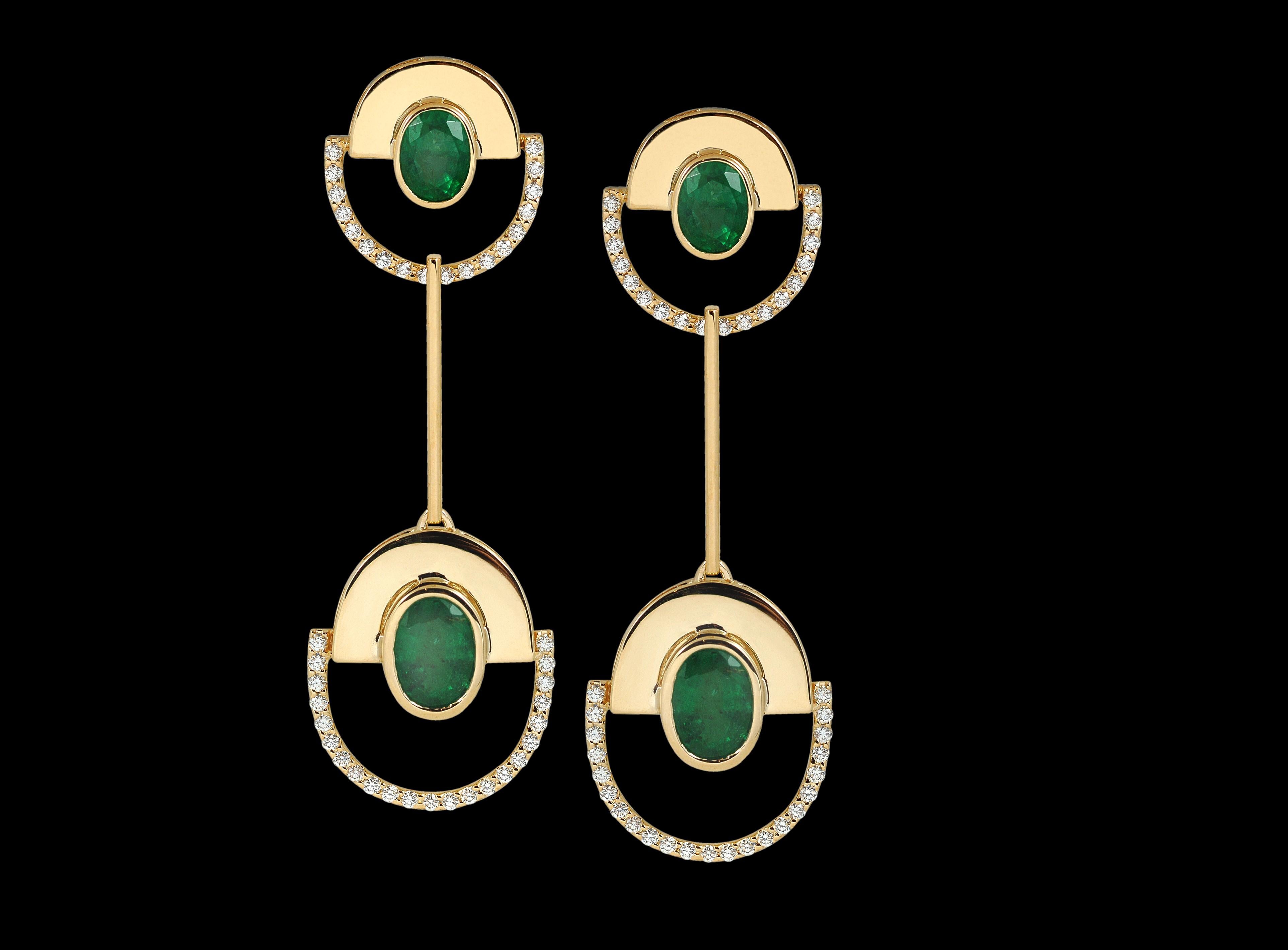 Emerald with Diamond Twist Reflection Earrings set in 18K Gold  Settings 


Width:  1.1 cm
Diameter:  5.1 cm


The TWIST Reflection is inspired by several abstract artist and heavily by Hilma Af Klint's works. The creative forces behind Kavant &