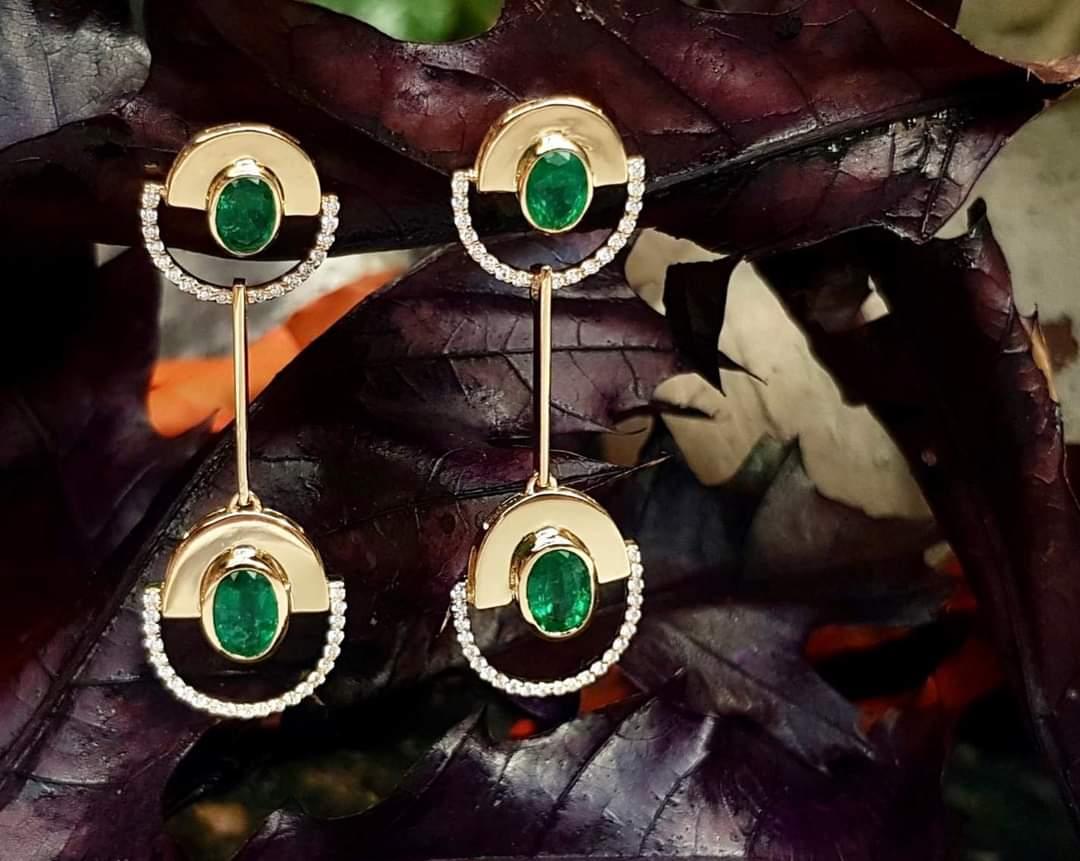 Oval Cut Emerald with Diamond Twist Reflection Earrings set in 18K Gold  Settings  For Sale