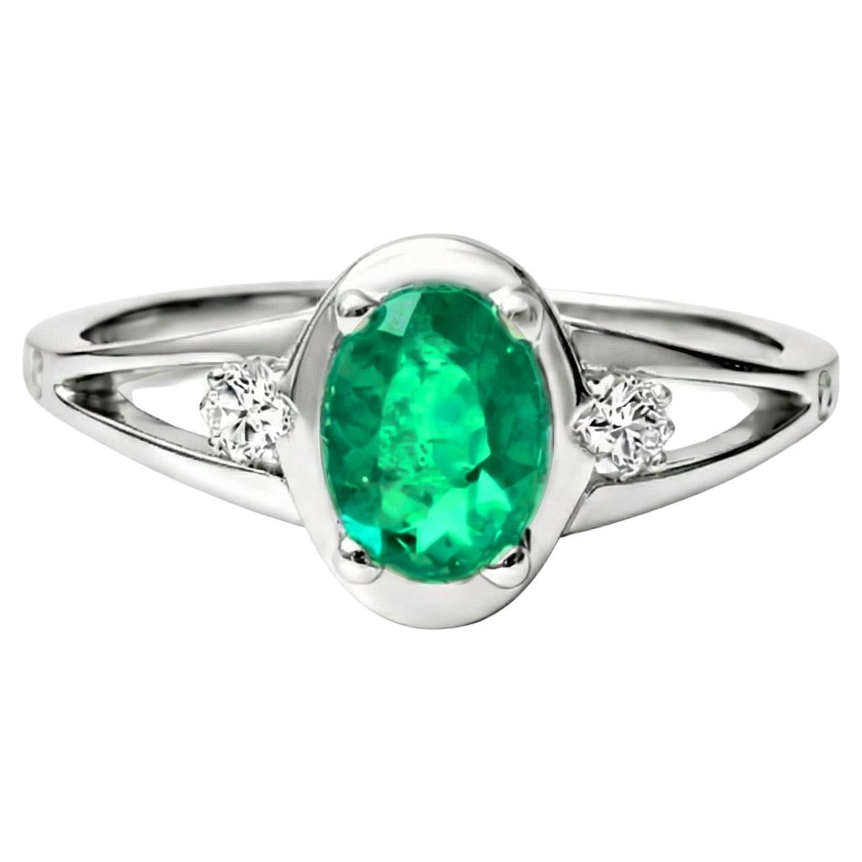 Emerald with Diamonds in White Gold Engagment Ring by Alexander Leyser en venta