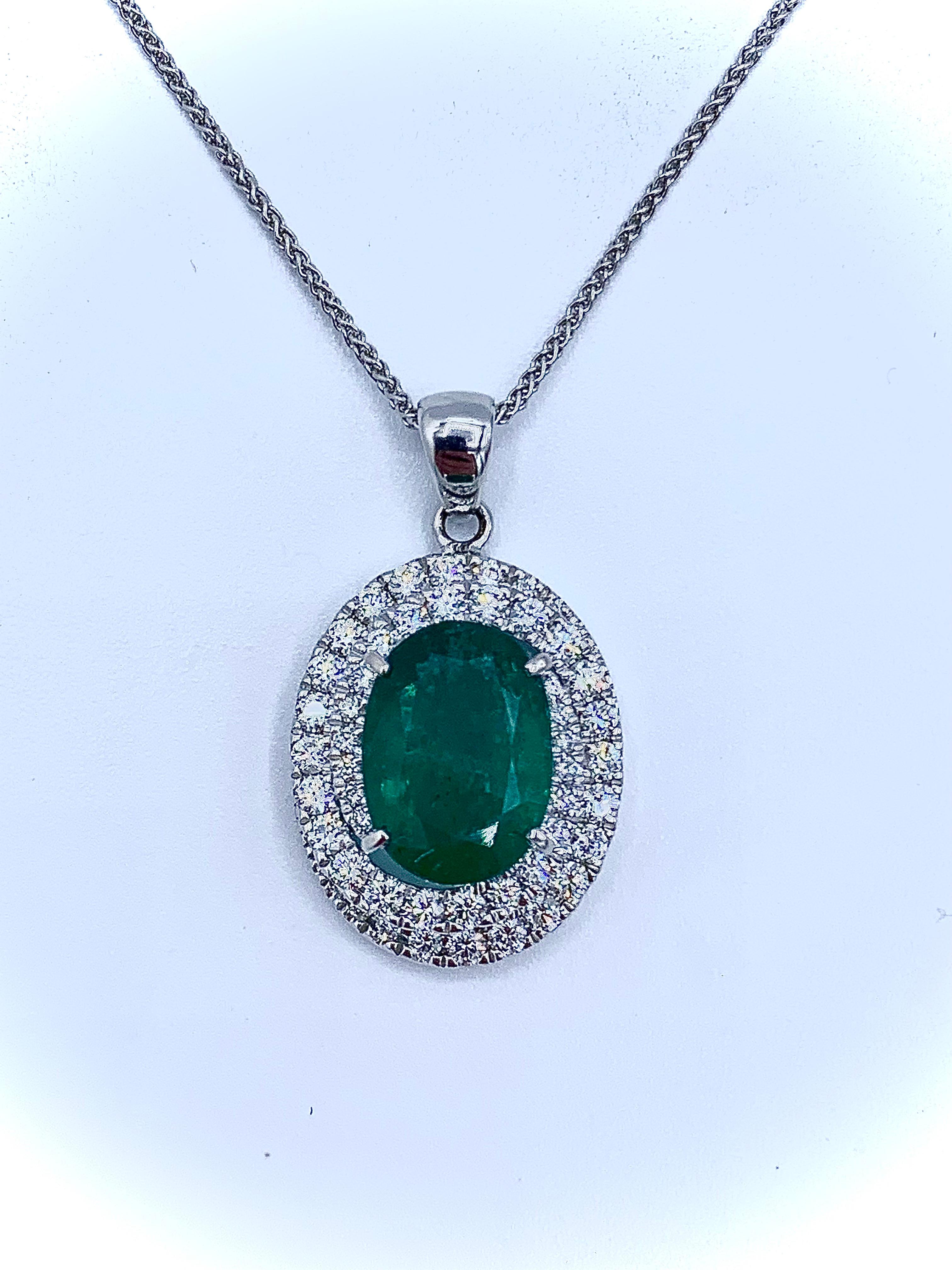 Contemporary Emerald with Dimond Spiral Halo Pendant For Sale
