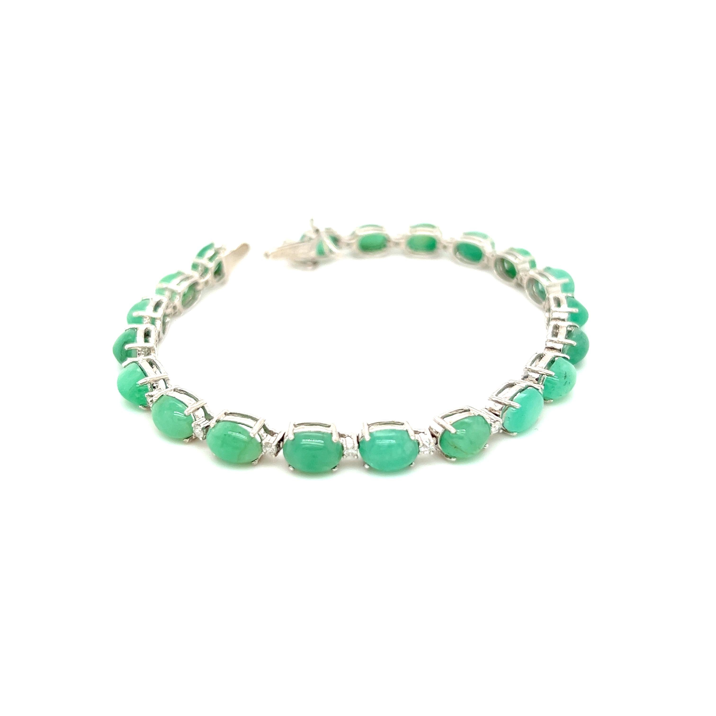  This statement bracelet is the ultimate accessory. It combines a classic, modern look with the romance of emeralds and diamonds. With 0.40ct of round-cut diamonds and 17.30ct of emeralds, this bracelet is sure to catch the eye of all who see it.
