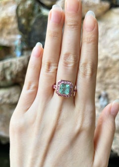 Anillo de Esmeralda con Zafiro Rosa engastado en Oro Rosa de 18K