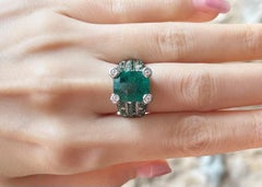Emerald with Tsavorite and Diamond Ring set in 18K White Gold Settings