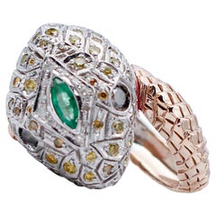 Bague en forme de serpent en émeraude, diamants jaunes et noirs, or rose et argent