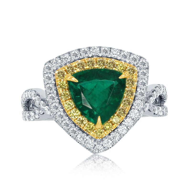 18k White Gold 1.57 ct Emerald 0.99 ct Yellow Diamond Ring

An impressive double halo of white and yellow diamonds makes the
green of this emerald trillion pop.
Item: # 02503
Metal: 18k W / Y
Color Weight: 1.57 ct.
Diamond Weight: 0.99 ct.