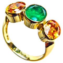 Dreisteinring mit Saphir und Smaragd aus 18 Karat Gold