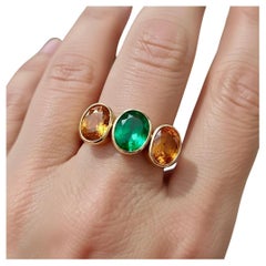 Emerald Yellow Sapphire Three Stone Ring 18 Karat Yellow Gold