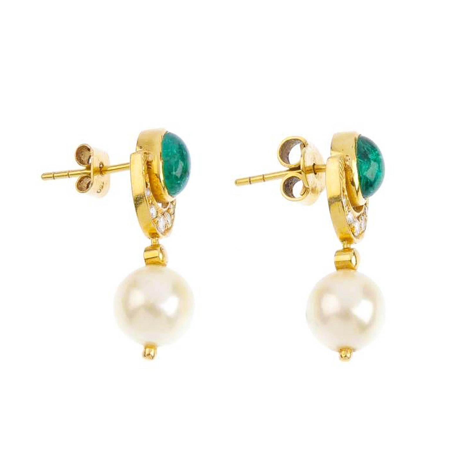 18ct gold, emerald, cultured pearl and diamond earrings. Each designed as a cultured pearl, measuring 10mms, with brilliant-cut diamond crescent and oval emerald cabochon surmount. Estimated total diamond weight 0.20ct. Length 2.8cms. Weight 7.2gms.