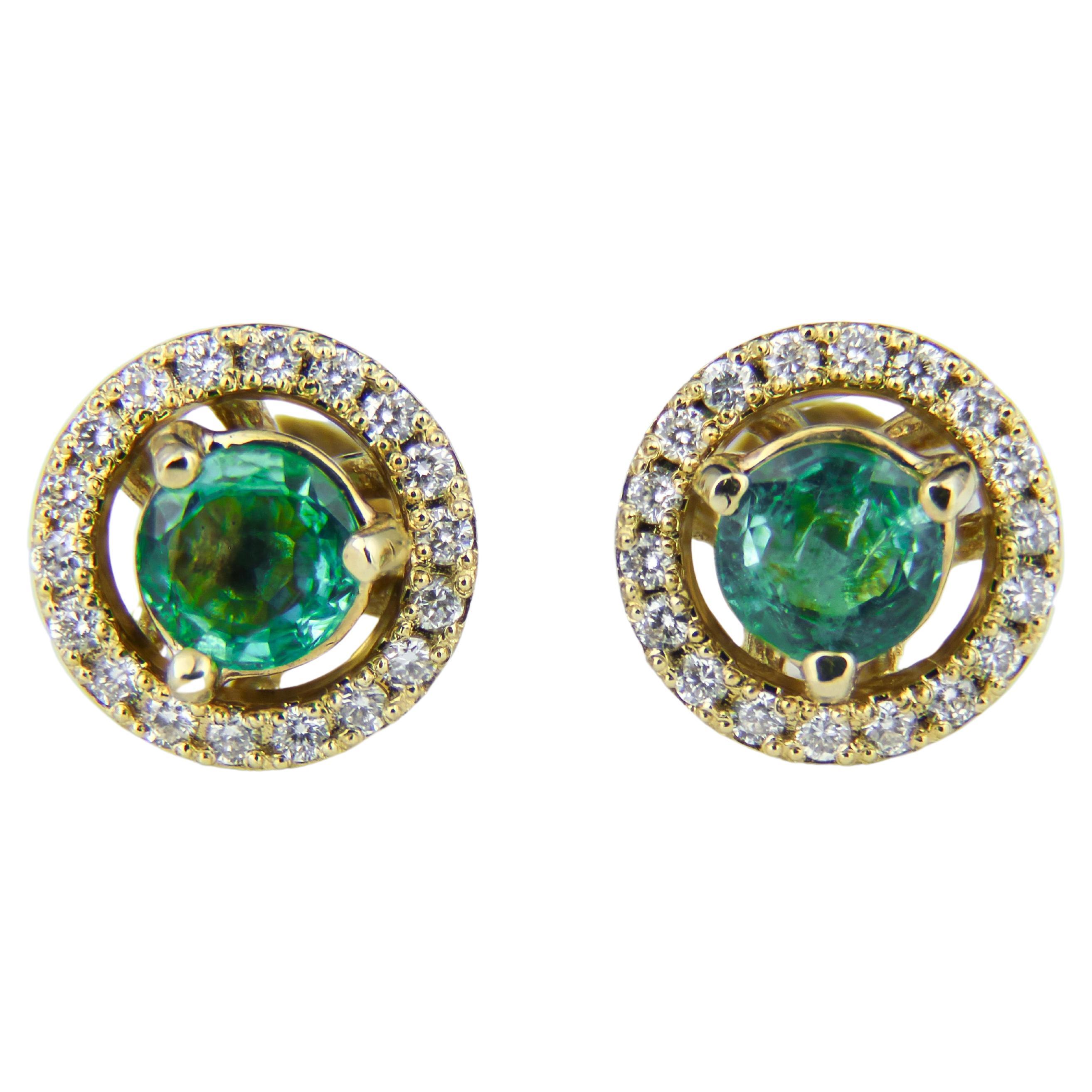 Emeralds 14k gold earrings studs.
