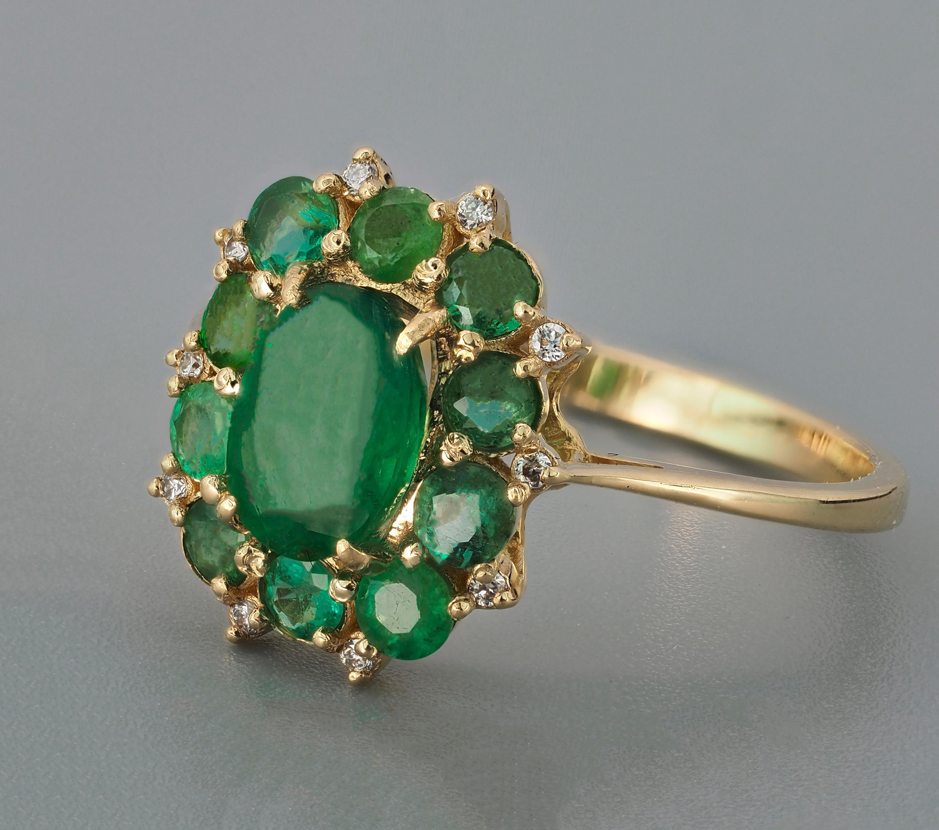 Oval Cut Emeralds and Diamonds 14k Gold Ring