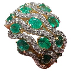 Anello con smeraldi e diamanti in oro 18 carati