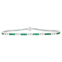 Bracciale Tennis Smeraldi e Diamanti Taglio Rotondo 3,65 Carati Oro 18K