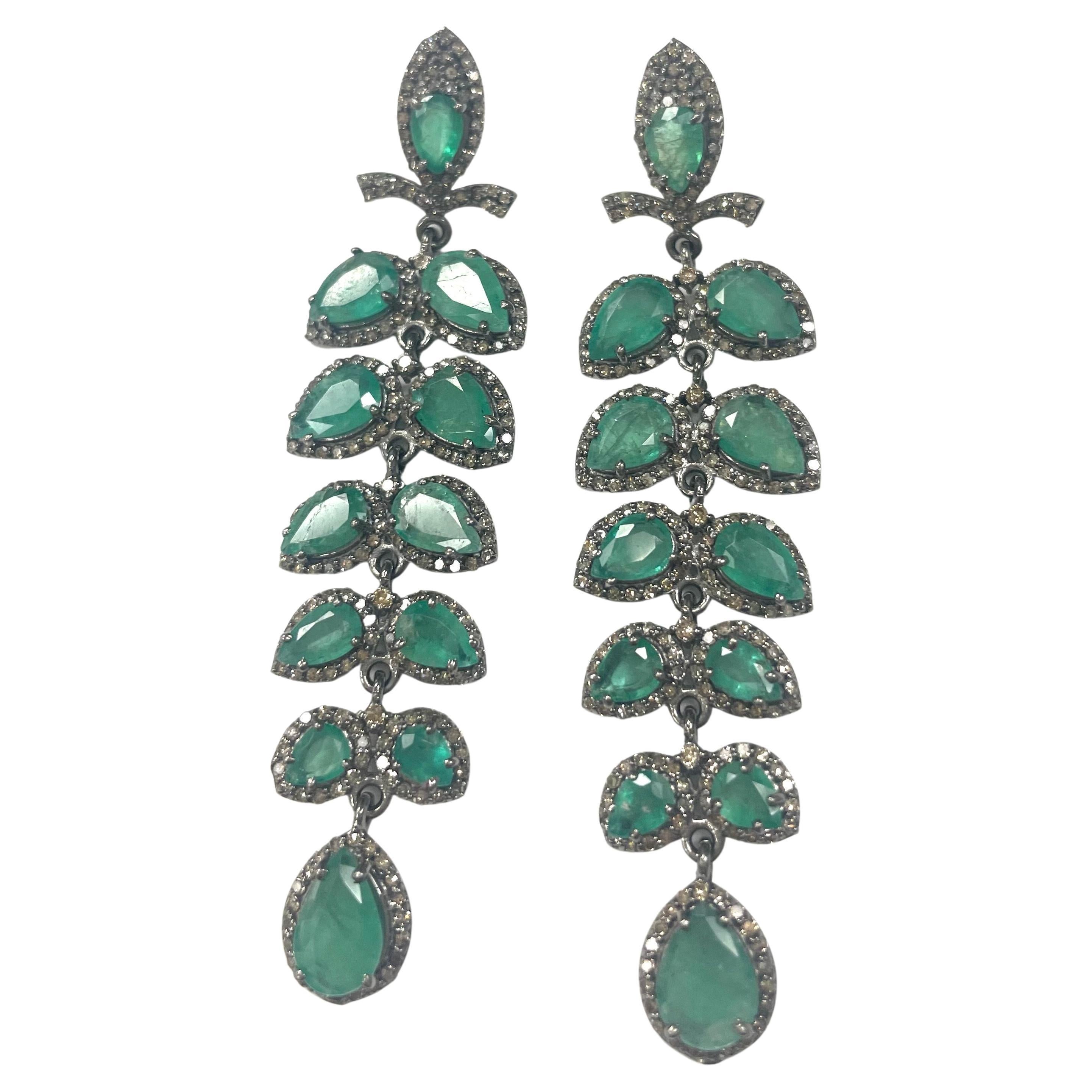 Description
Exquisite vibrant green Emeralds, individually framed with pave diamonds creating an elegant stylish statement of beauty and movement. Item #E3309

Materials and Weight
Emeralds, 16 carats, faceted pear shapes
Diamonds, 3.74