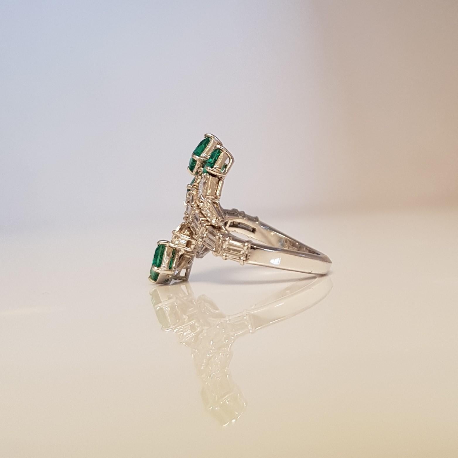 Contemporary Emeralds and White Diamonds Platinum Ring For Sale
