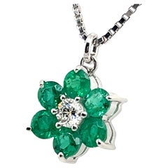 Emeralds & Diamond Flower Necklace in 18 Karat White Gold