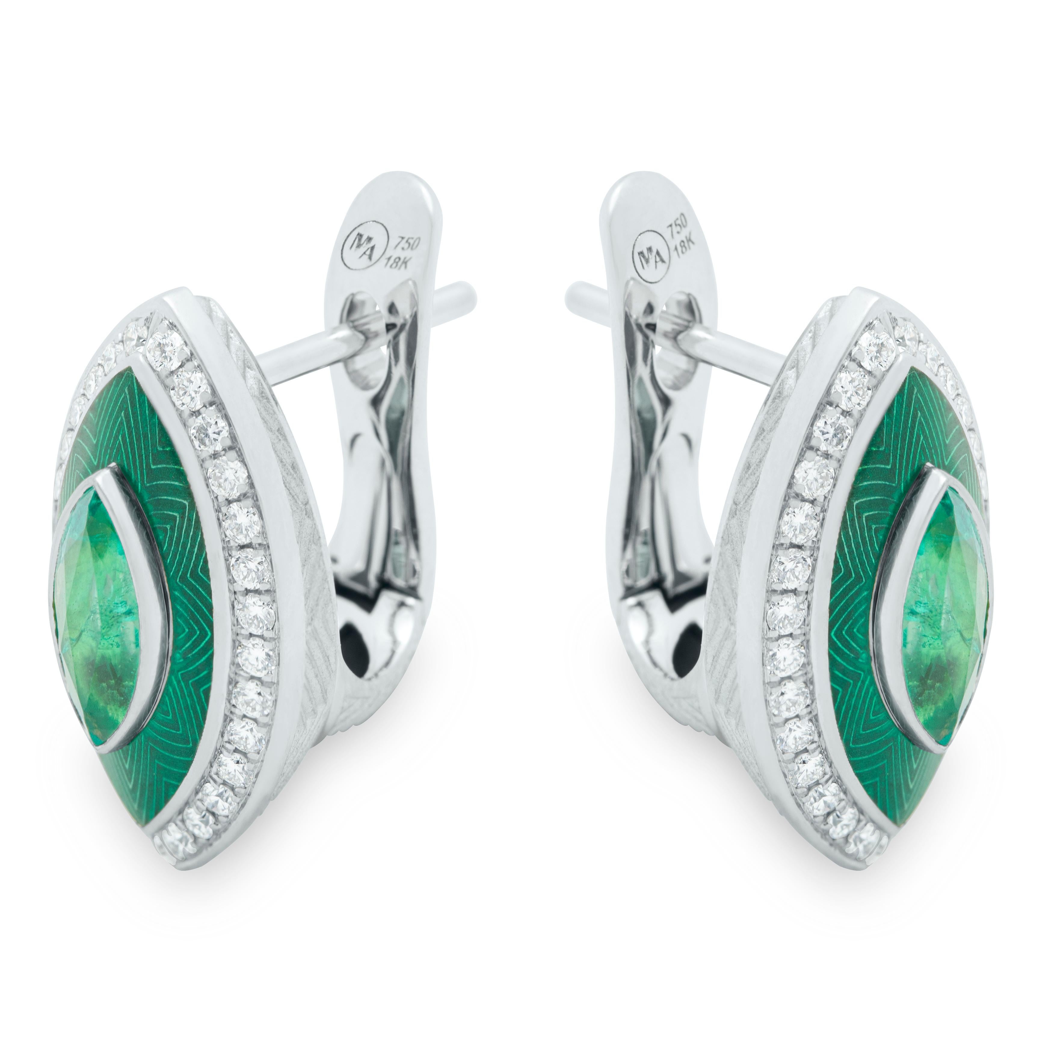 Emeralds Diamonds 18 Karat White Gold Tweed Marquise Earrings
What we presented to you are Earrings from our famous Tweed collection. But it was made in an unusual form of a marquise. Incredibly beautiful green shades of two central stones Emeralds