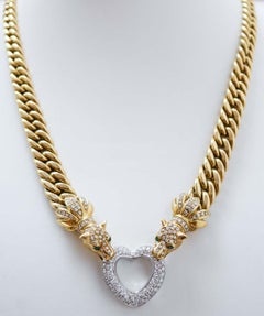 Collana con smeraldi, diamanti, oro giallo 18 carati e oro bianco.