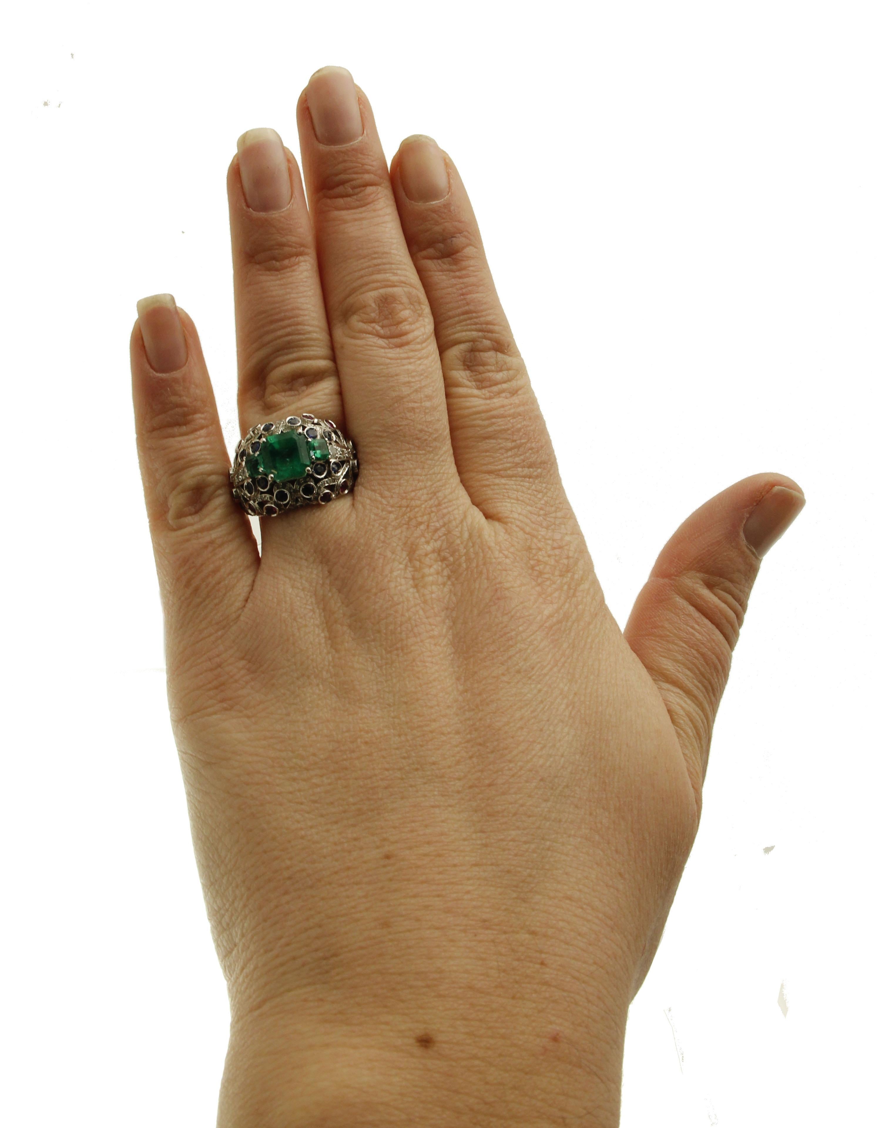 Brilliant Cut Emeralds, Diamonds, Blue Sapphires, Rubies 18 Karat White Gold Cluster Ring For Sale