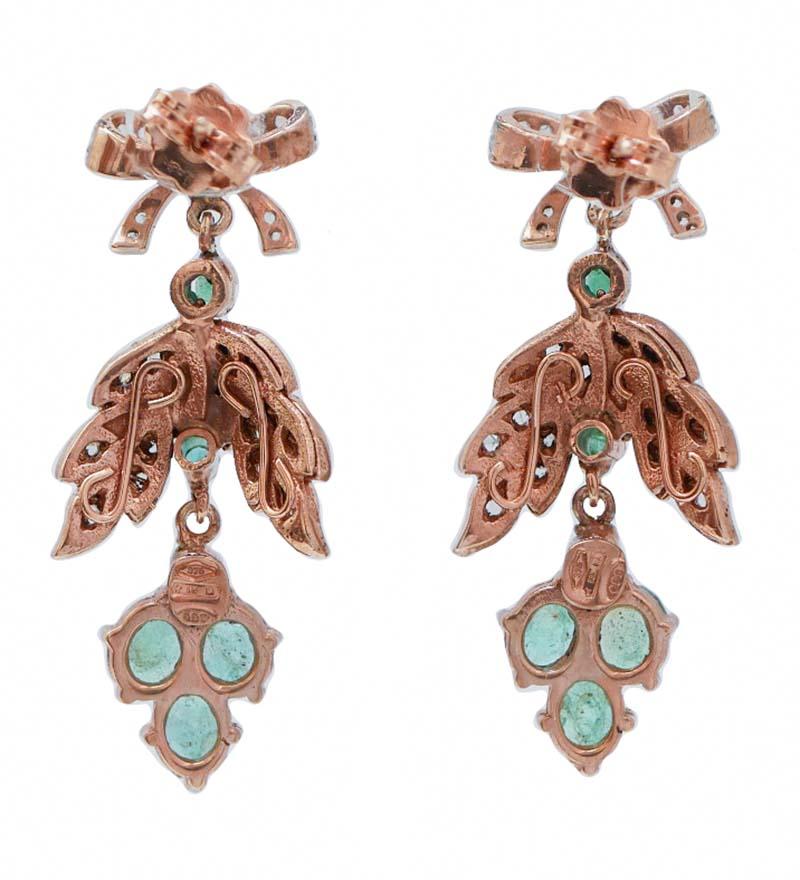 Rétro Boucles d'oreilles en or rose, émeraudes et diamants. en vente