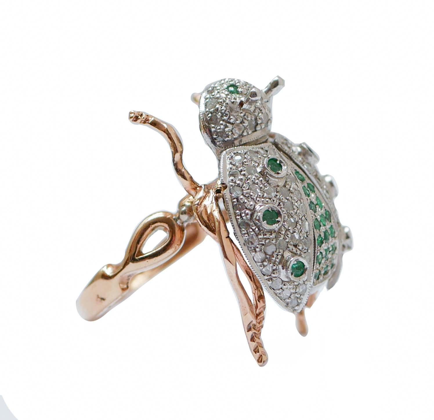 Gorgeous ladybug shape ring in 9 karat rose gold and silver structure mounted with two emeralds as eyes, on the body and on the wings. Head and wings are studded with diamonds.
This ring was totally handmade by Italian master goldsmiths and it is in