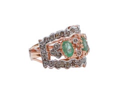 Emeraudes, diamants, bague en or rose et en argent.
