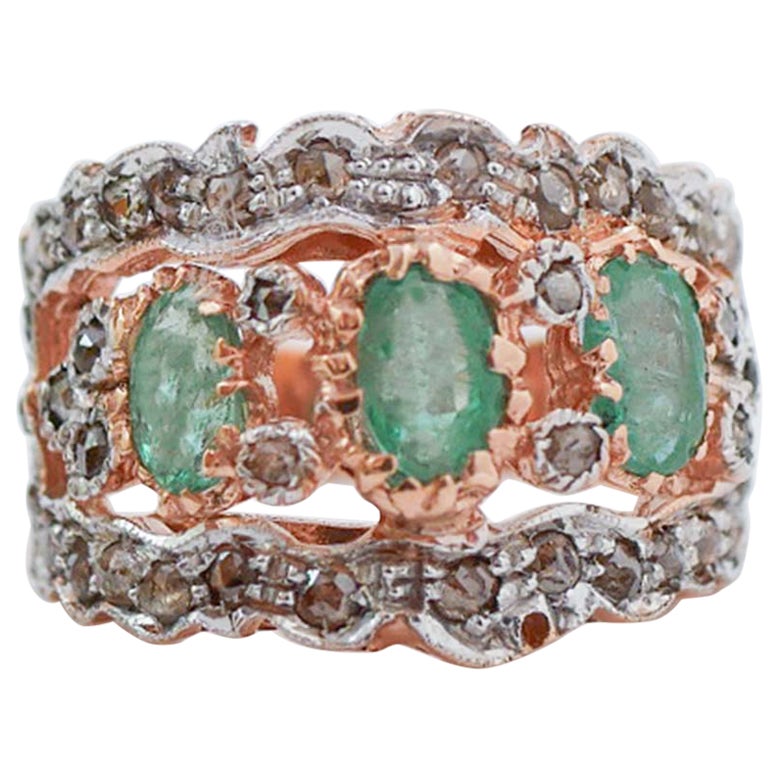 Emeralds, Diamonds, Rose Gold and Silver Ring. For Sale