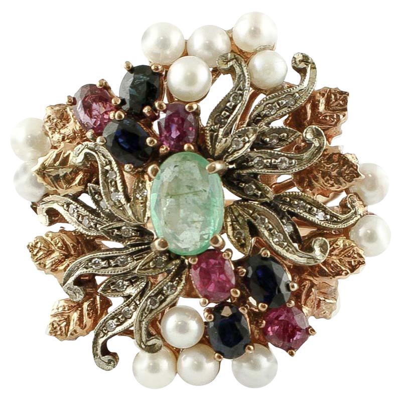 Emeralds Diamonds Rubies Blue Sapphires Pearls 9 Karat Rose Gold and Silver Ring