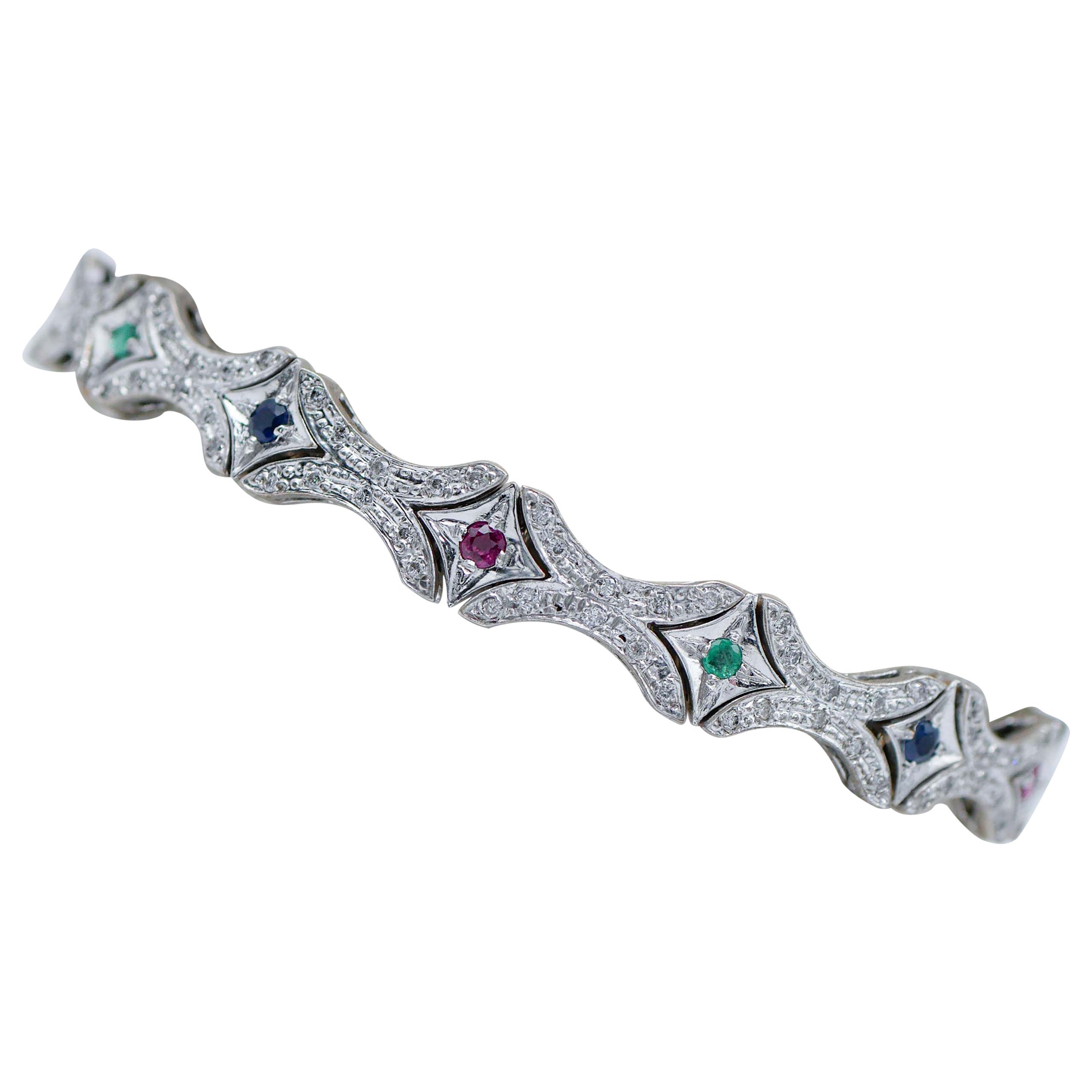 Esmeraldas, Rubíes, Zafiros, Diamantes, Pulsera de Oro Blanco de 12 Kilates.