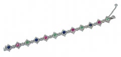Smeraldi, rubini, zaffiri, diamanti, bracciale in oro bianco 14 carati.