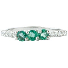 Emeralds, White Diamonds, 18 Karat White Gold Three-Stone Engagement Ring