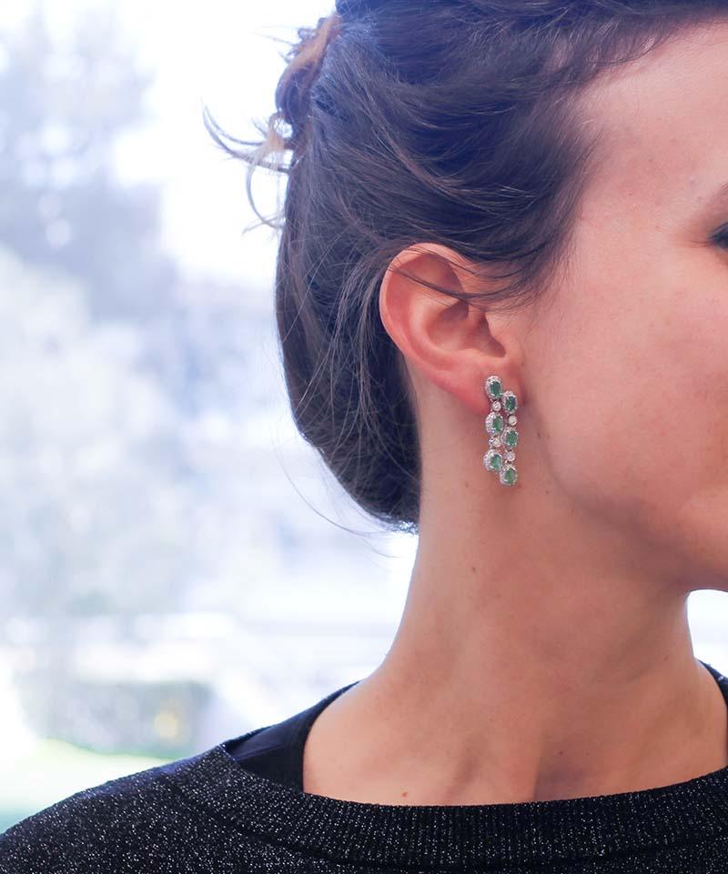 Women's Emeralds, Diamonds, 14 Karat White Gold Dangle Earrings.