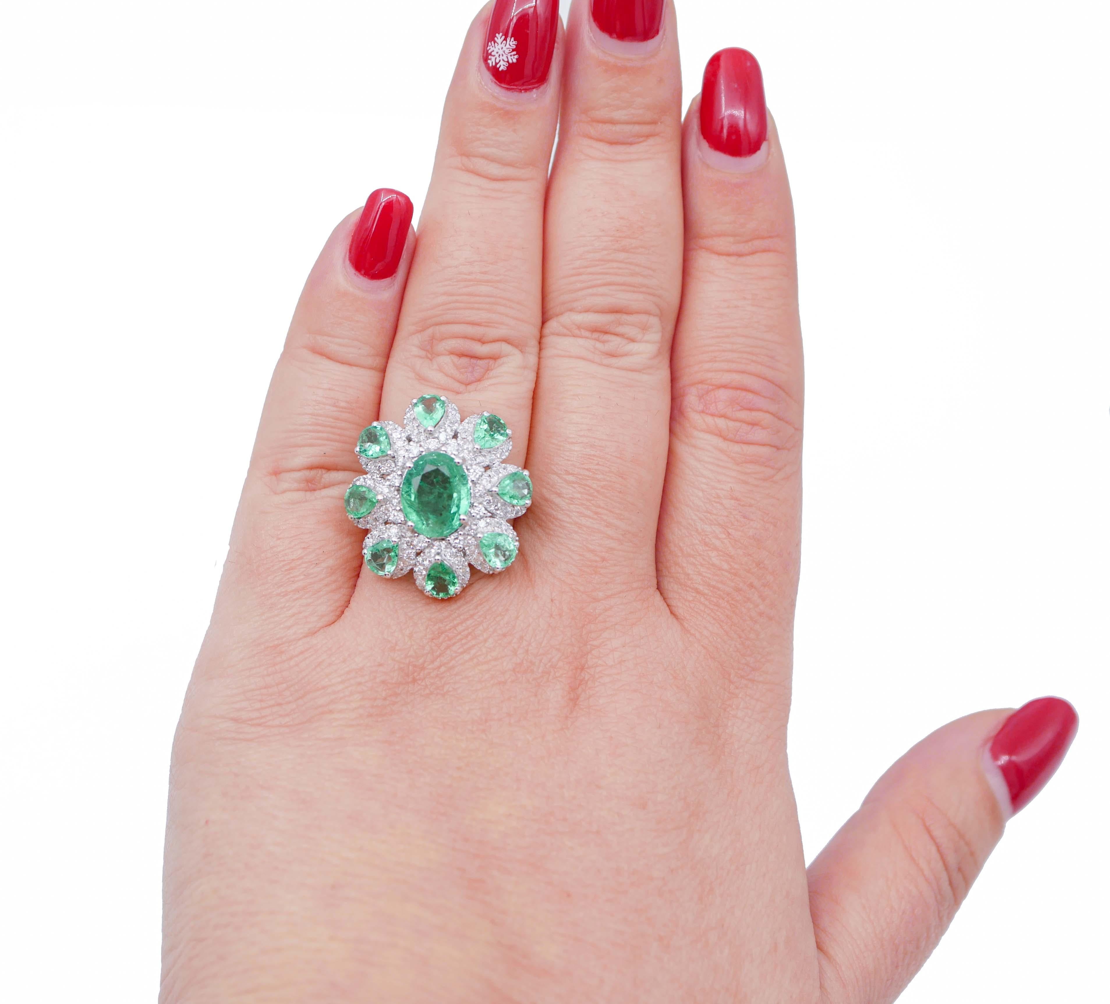 Retro Emeralds, Diamonds, 18 Karat White Gold Flower Ring For Sale