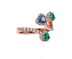Bague en or rose 18 carats, émeraude, saphir, diamants