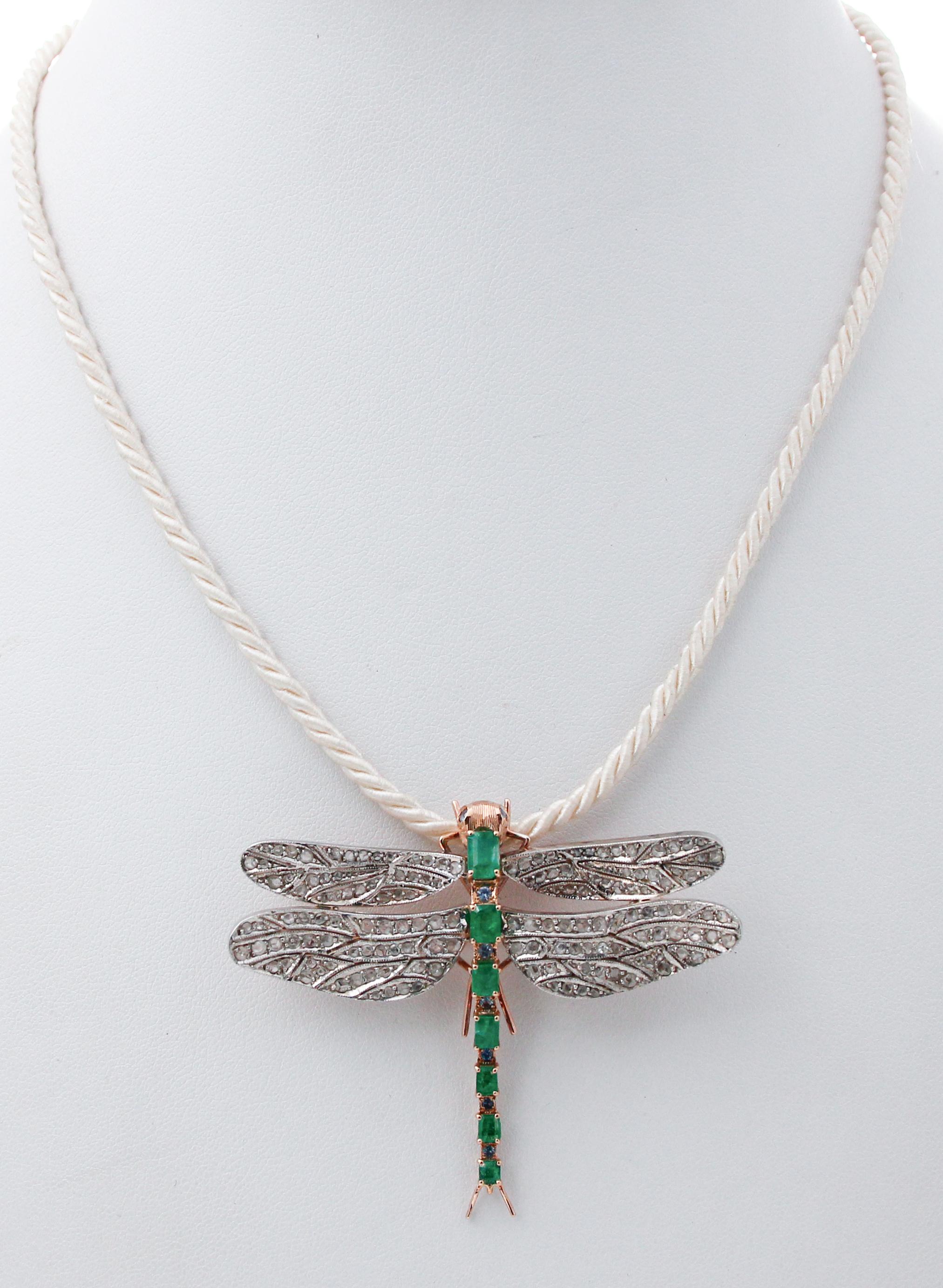 Beautiful pendant/brooch shaped dragonfly studded with emeralds and sapphires on the body; two sapphires as eyes and the wings are studded with diamonds.
This pendant/brooch is totally handmade by Italian master goldsmiths.
Diamonds 1.35 ct
Emeralds