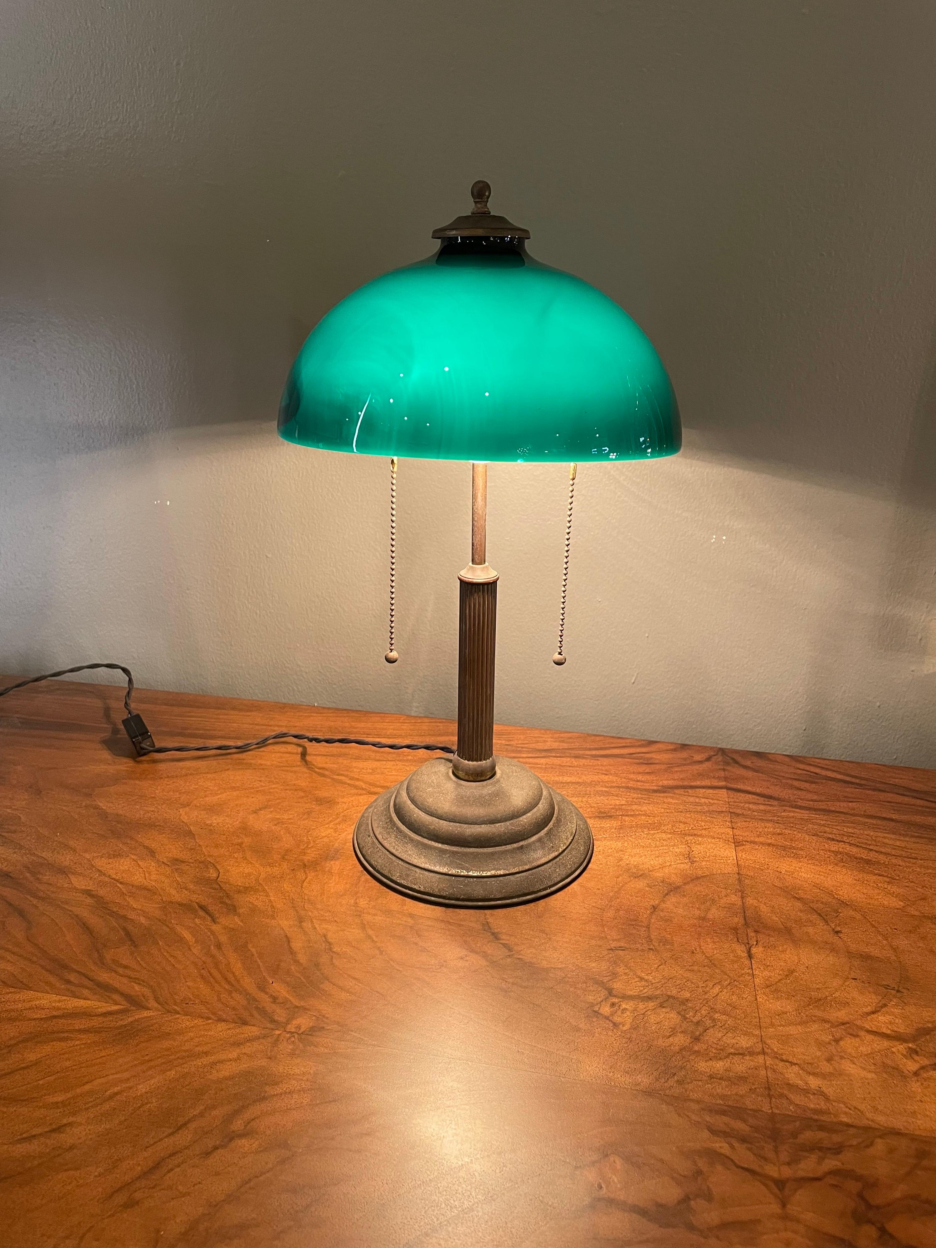 Beautiful hard-to-find Art Deco, desk table lamp freshly rewired original patinated finish, we put a beautiful new cloth cord and new sockets. The glass its beautiful when its lited.
