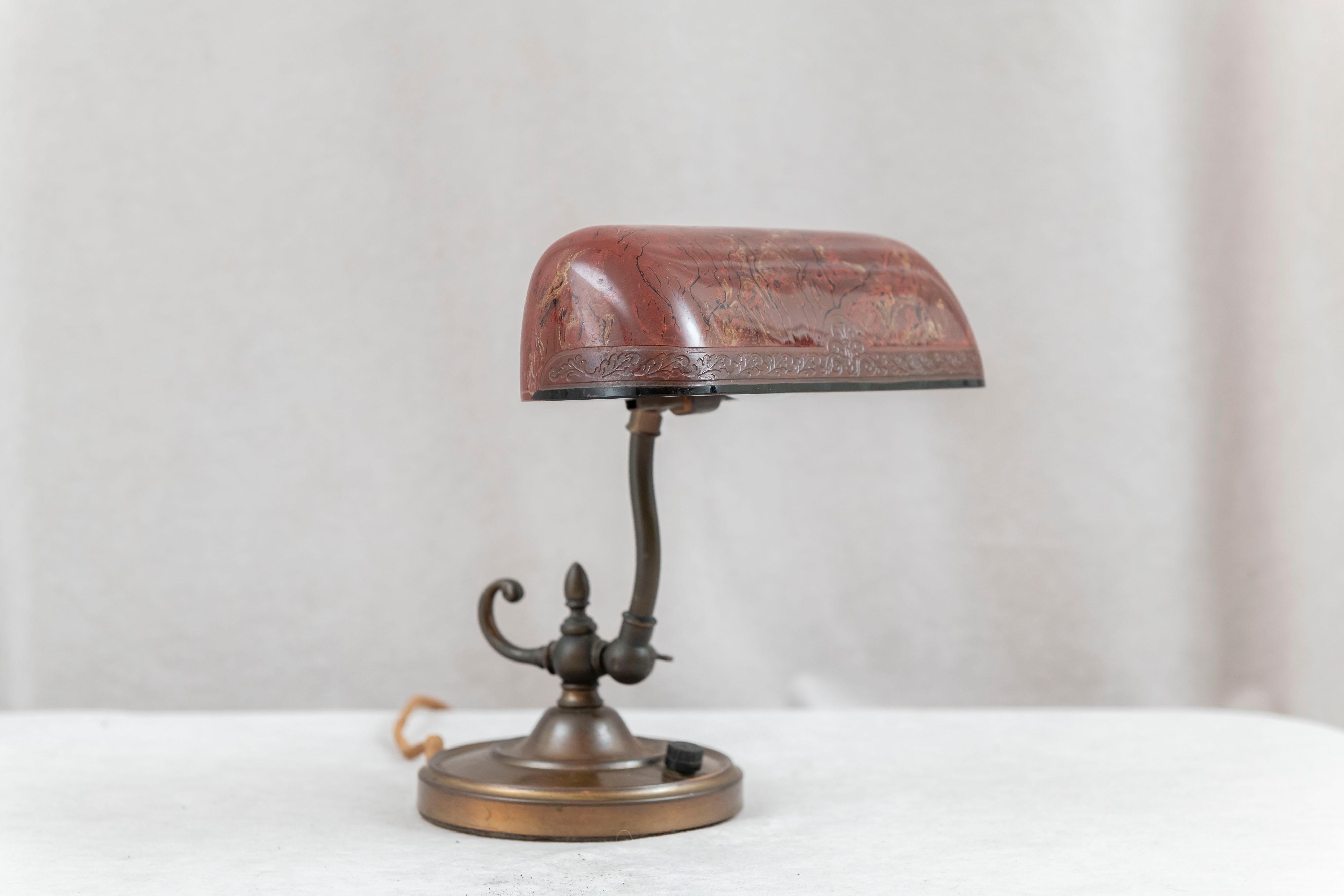   This very high quality desk lamp was produced by the Emeralite Co. The most respected and famous makers of Banker's lamps. On occasion when the company wanted a special glass shade, they had the Bellova Co. of Czechoslovakia make one, like ours.