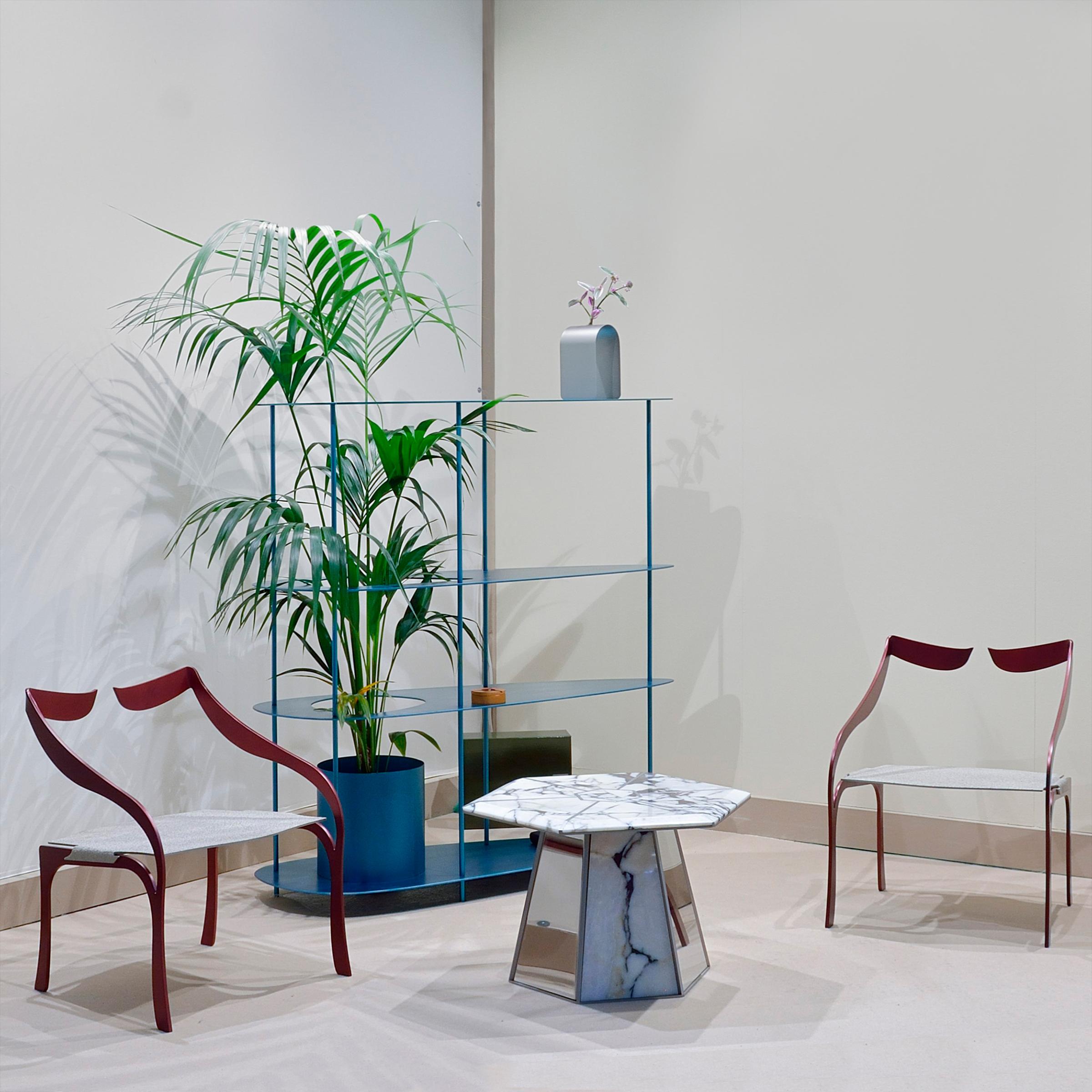 Emerso Calacatta Marble and Titanium Coffee Table by WM Metal Design
Dimensions: D 70 x H 44 cm. 
Materials: Calacatta Viola marble, titanium, stainless steel.

EMERSO is a tribute to nature, shaven but still alive.
The table, dedicated to the