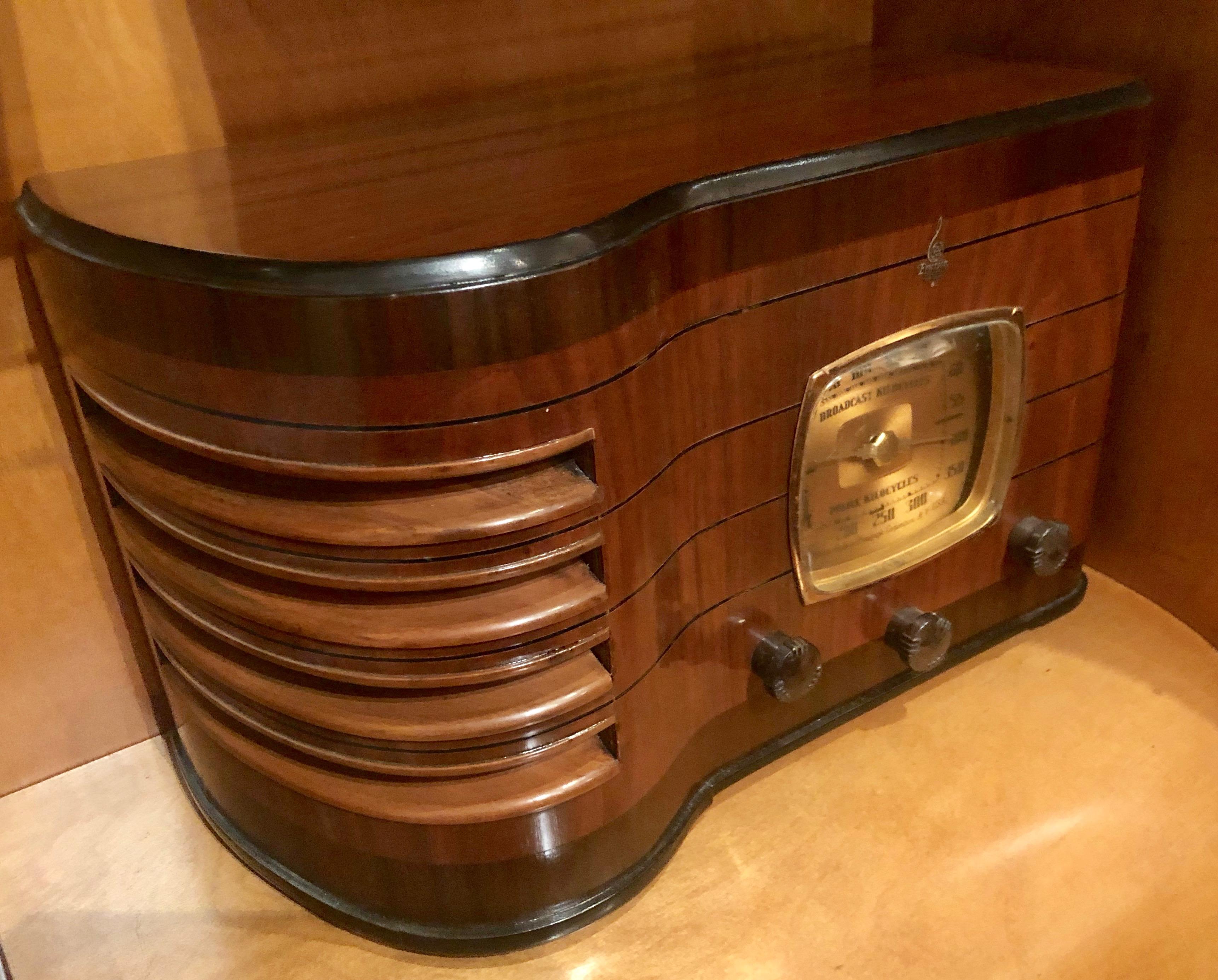 The Emerson 167 is a restored Art Deco 6 Tube Radio with Bluetooth. The Unique Ingrahm cabinet was built in 1938. The clean chassis and all waxed paper capacitors have been replaced by modern equivalents, the tubes and resistors have been tested and