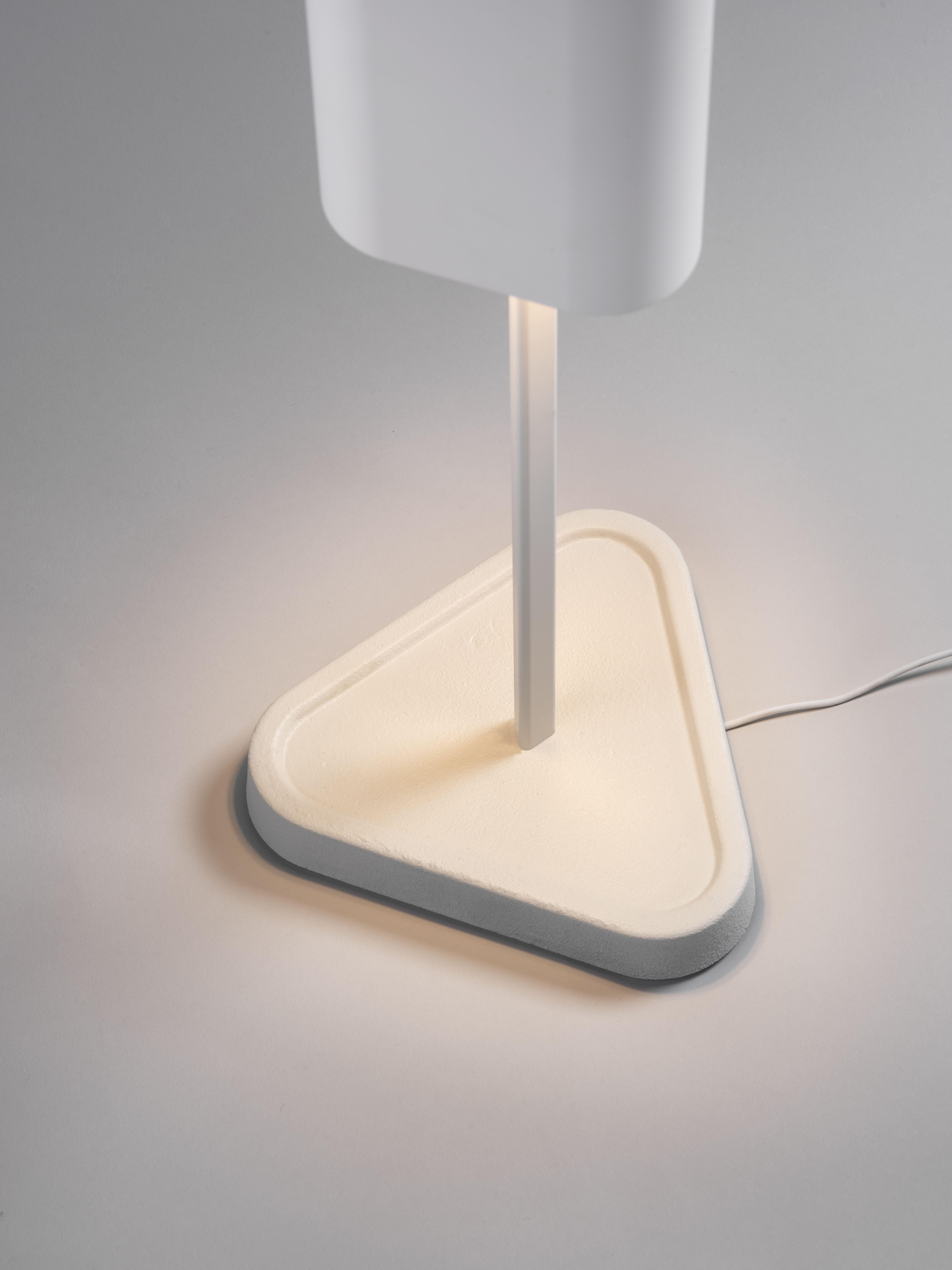 An intriguing yet powerful new lighting solution, Emi creates a captivating visual experience while delivering exceptional illumination.

Emi features a triangular profile formed by grouping three concealed light modules within a linear matte