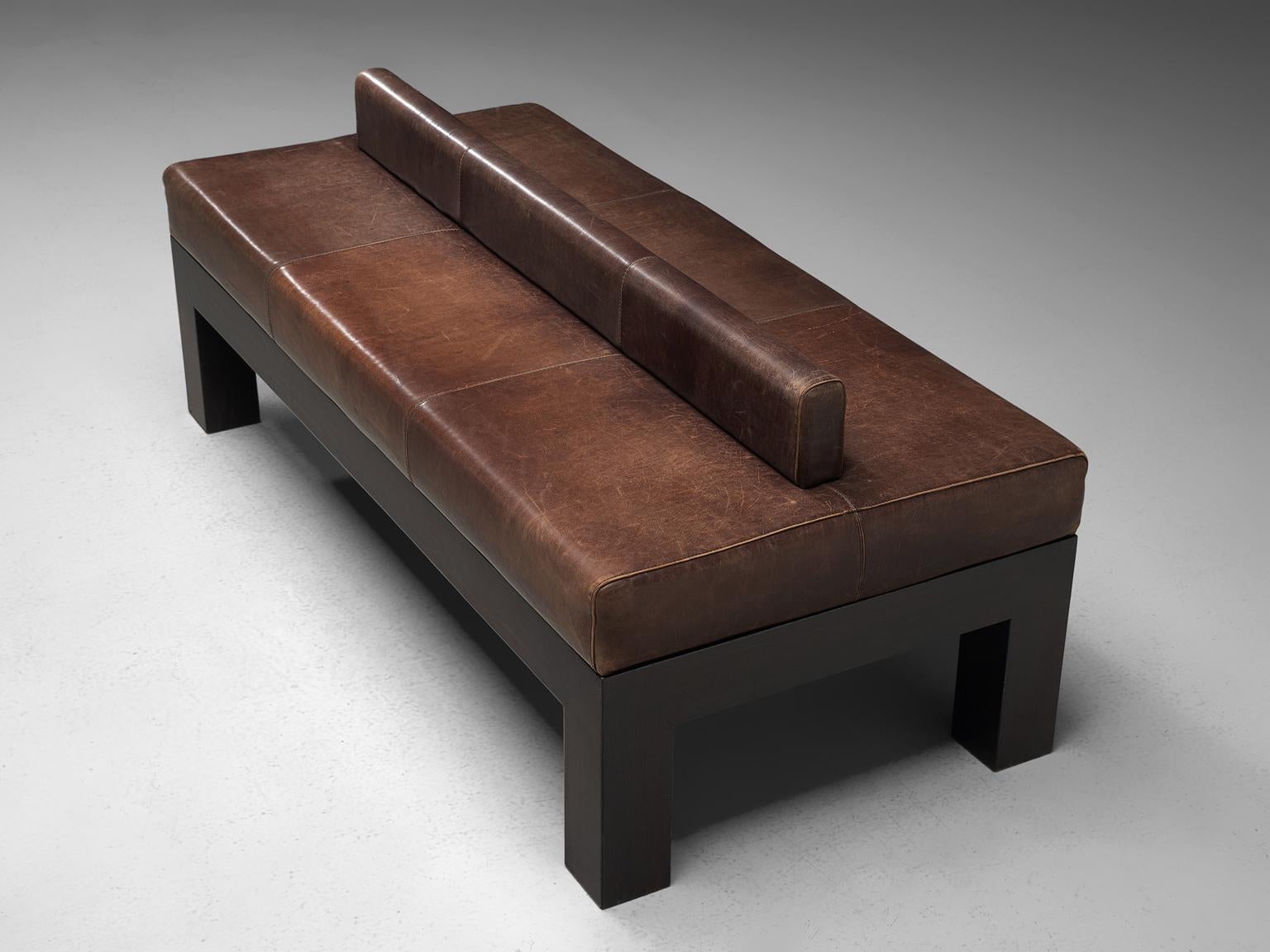 Emiel Veranneman, bench-sofa, brown buffalo leather and darkened oak, Belgium, 1960s

This wonderful custom made piece is designed by Emiel Veranneman for a private client. This functionalist bench with a robust solid oak frame shows a design