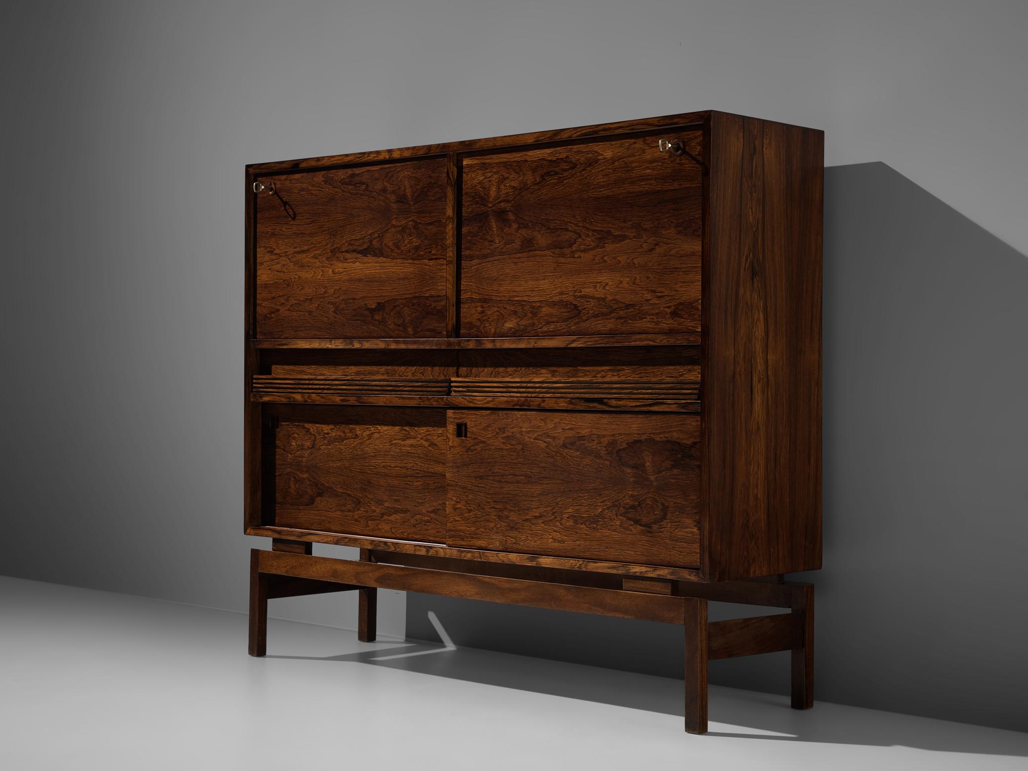 Emiel Veranneman for V-Form, rosewood, Belgium, 1959

This rare to find bar cabinet by Emiel Veranneman. Veranneman designed this bar cabinet for V-Form in the early years of his career, in 1959. Already some clear design traits of Veraneman are