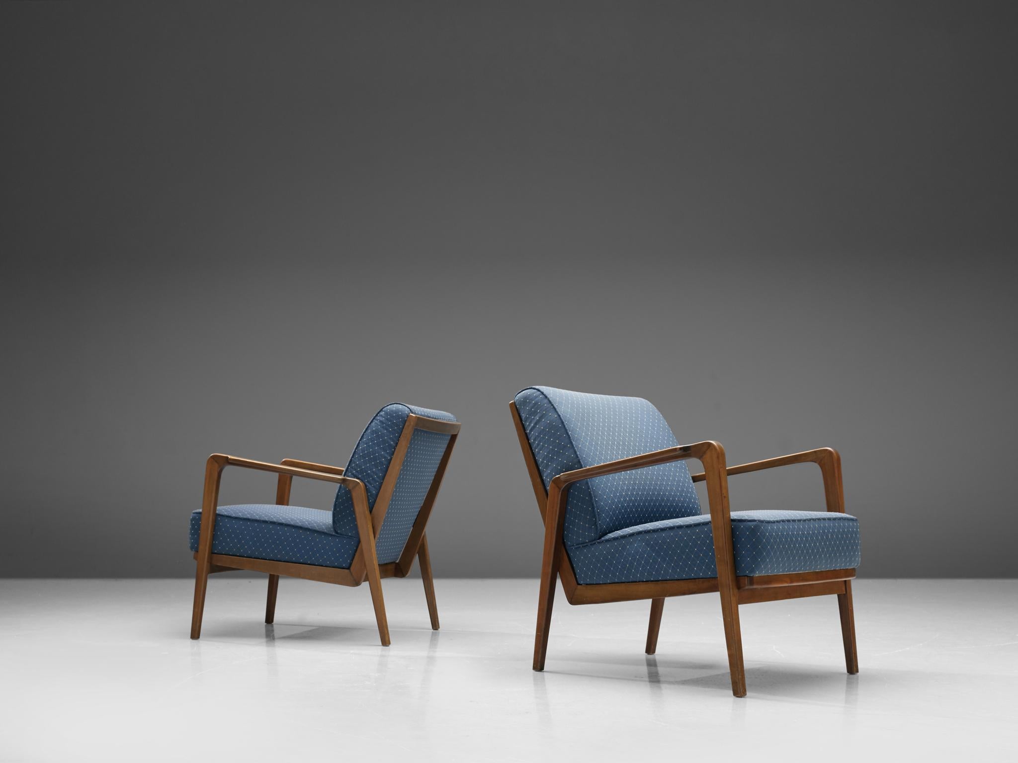 Emiel Veranneman, Two easy chairs 'La Chaise' , in mahogany and blue upholstery, Belgium, 1952.

Pair of elegant armchairs with blue upholstery by the Belgian designer Emiel veranneman. The thick, comfortable cushions make a wonderful chair to sit