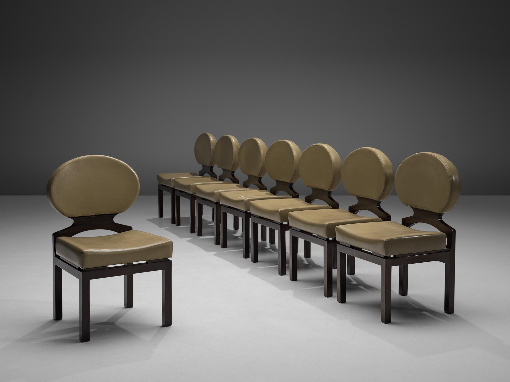 Emiel Veranneman, set of eight 'Osaka Chairs', wood and leather, Belgium 1970.

The Osaka dining chair was designed by Emiel Veranneman for the Belgian pavilion at the Wold Exhibition 1970 in Osaka, Japan. With their round backrests these chairs