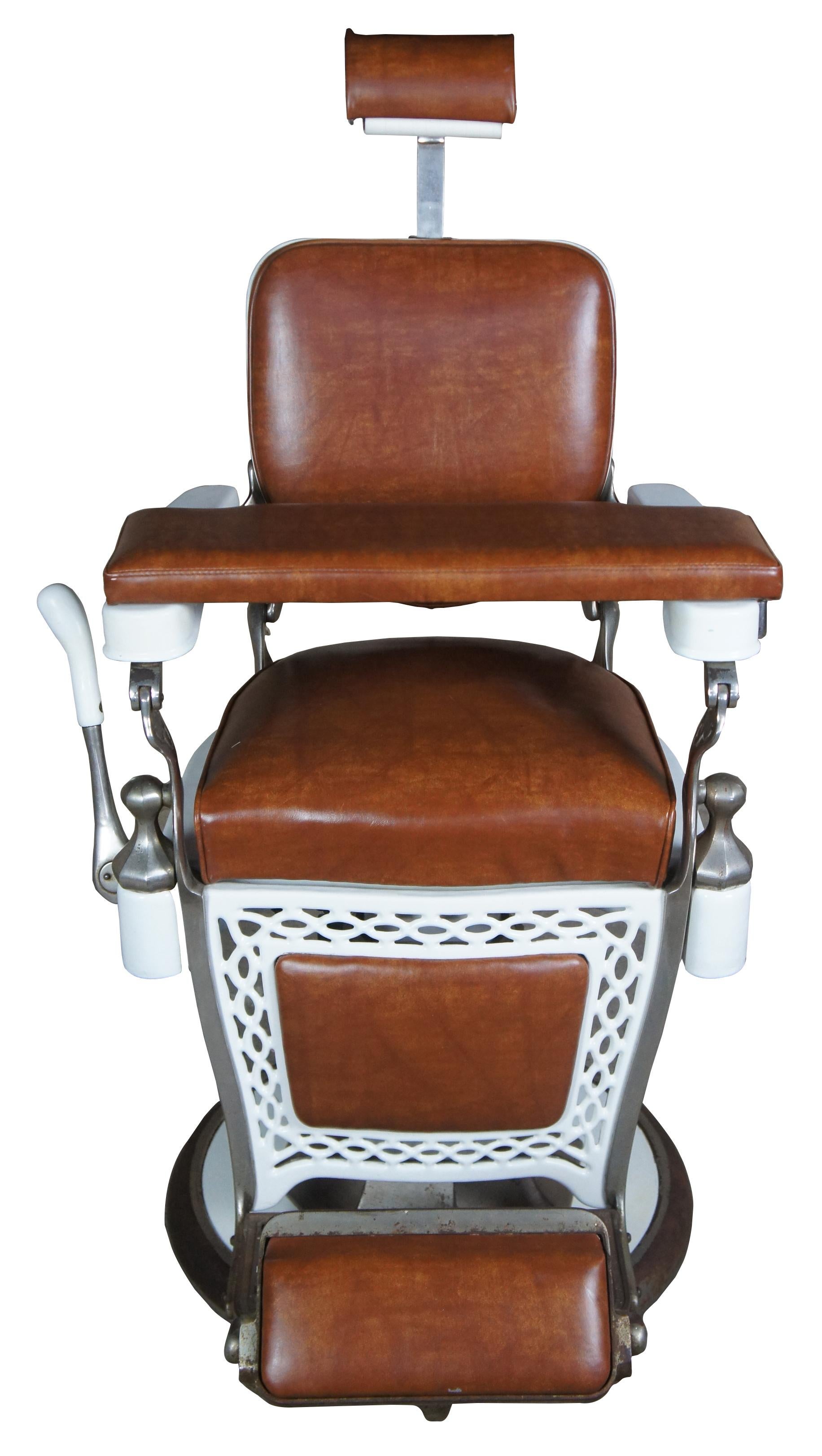 Emil J Paider antique cast iron hydraulic leather barbers chair fully functional

Emil J. Paider barbers chair. White enameled cast iron with brown leather. Features ornate details, adjustable headrest, fully functional hydraulics.